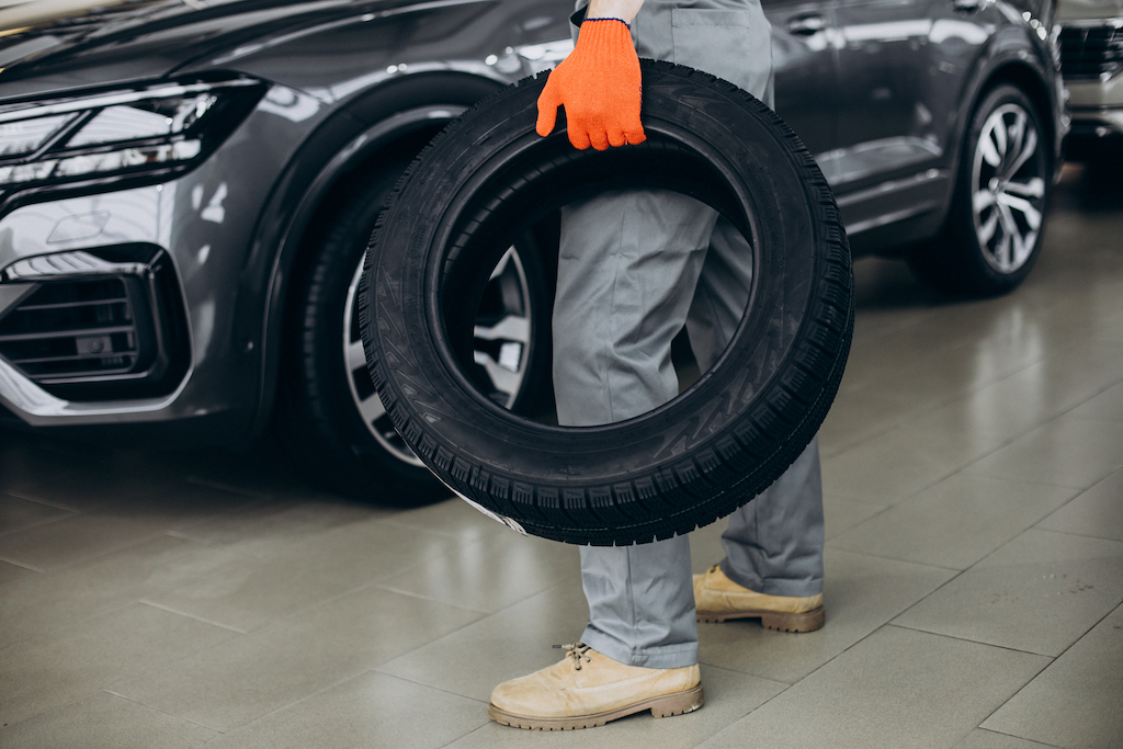 mechanic-changing-tires-car-service